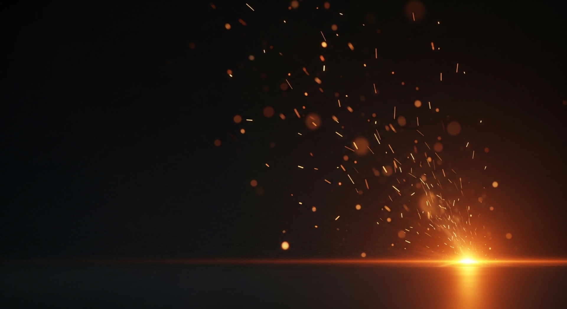 Glowing embers and sparks rising in the dark — Premium Fires, wood fire specialists in Whangārei and Northland